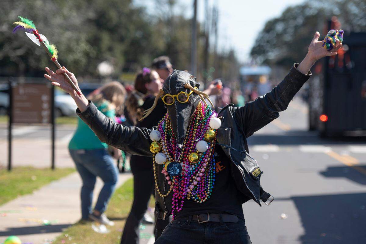 A reveler during the Jackson County Carnival Association Mardi Gras parade in Pascagoula on Saturday, March 1, 2025.