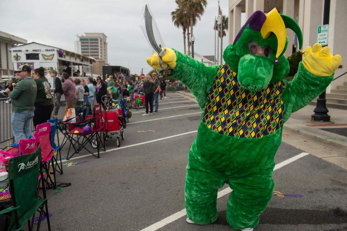 A mascot is seen during the Krewe of Gemini parade in downtown Gulfport on Saturday, Feb. 10, 2024.