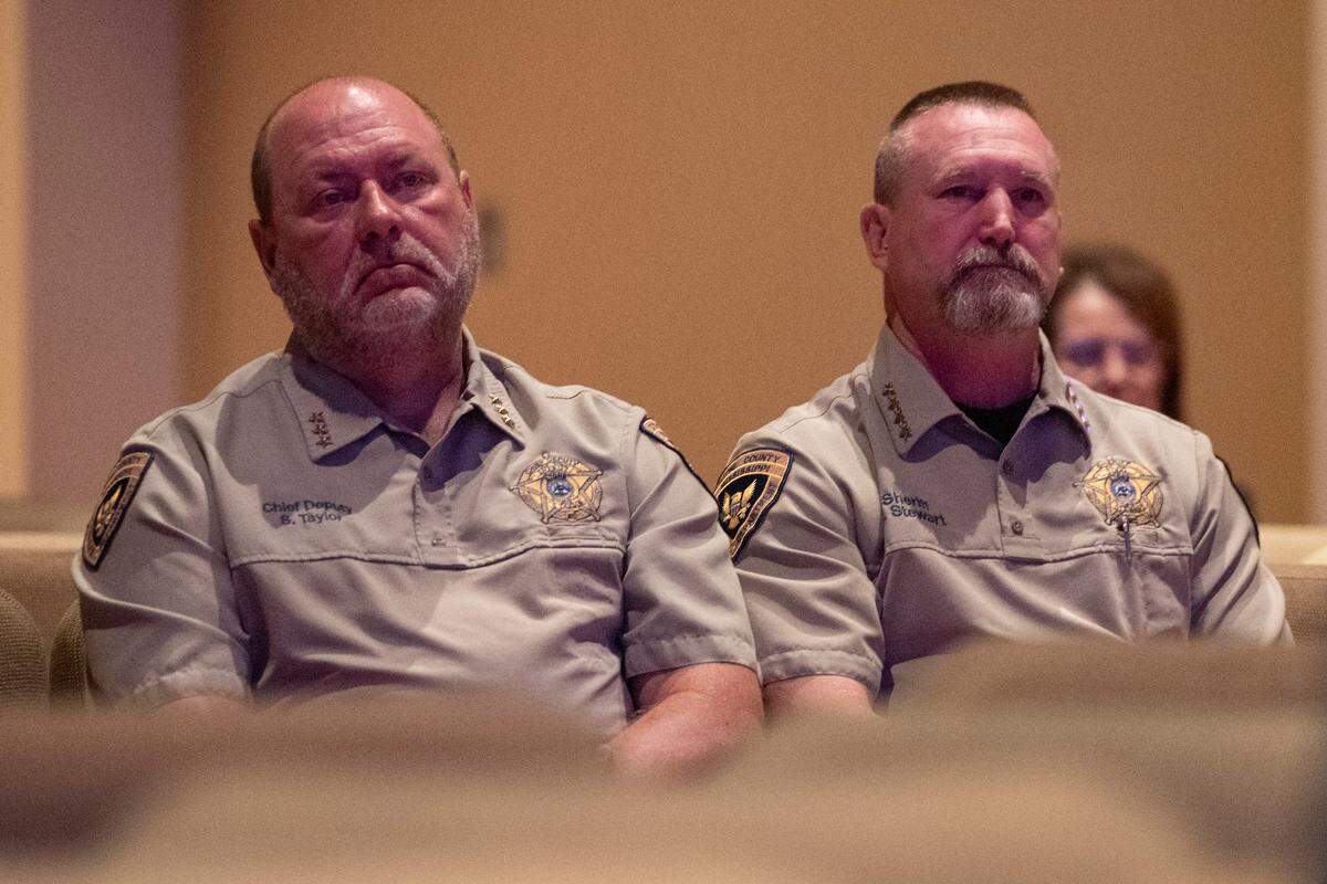 Stone County sheriff Todd Stewart, right, attends a coast-wide candlelight ceremony as a part of National Crime Victims’ Rights Week at First Baptist Church of Gulfport on Tuesday, April 29, 2025.