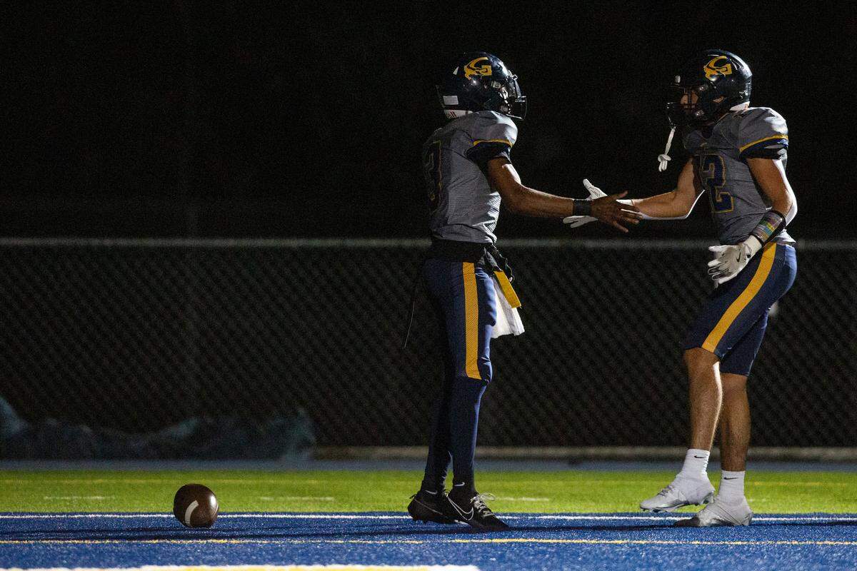 Gautier quarterback Trey Irving and Sabo Gonzalez react after a touchdown during a 5A playoff game between Gautier and Natchez at Gautier High School on Friday, Nov. 15, 2024.