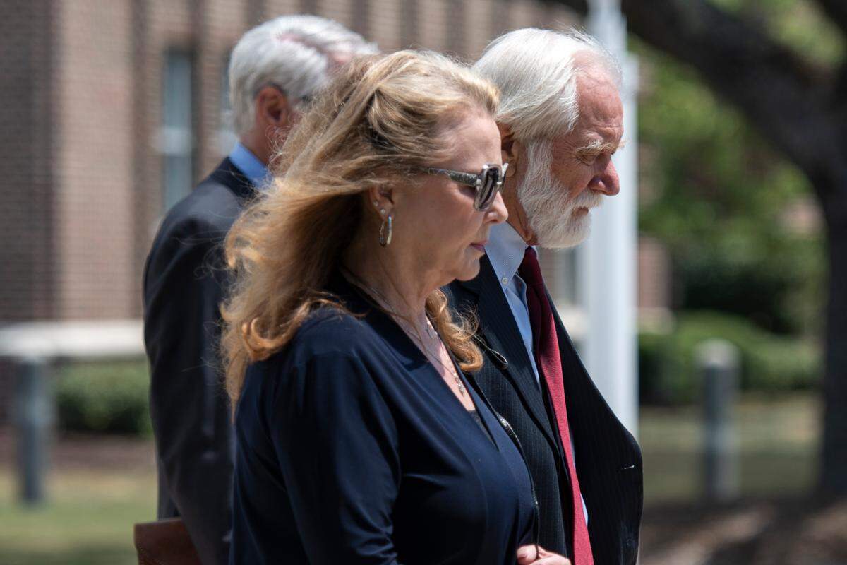 Clell Rosetti, owner of Quality Poultry and Seafood, right, and a family member walk out of Dan M. Russell Jr. Courthouse in Gulfport on Tuesday, Aug. 27, 2024, after pleading guilty to conspiring with Mary Mahoney’s Old French House to mislabel cheaper foreign fish as Gulf seafood.