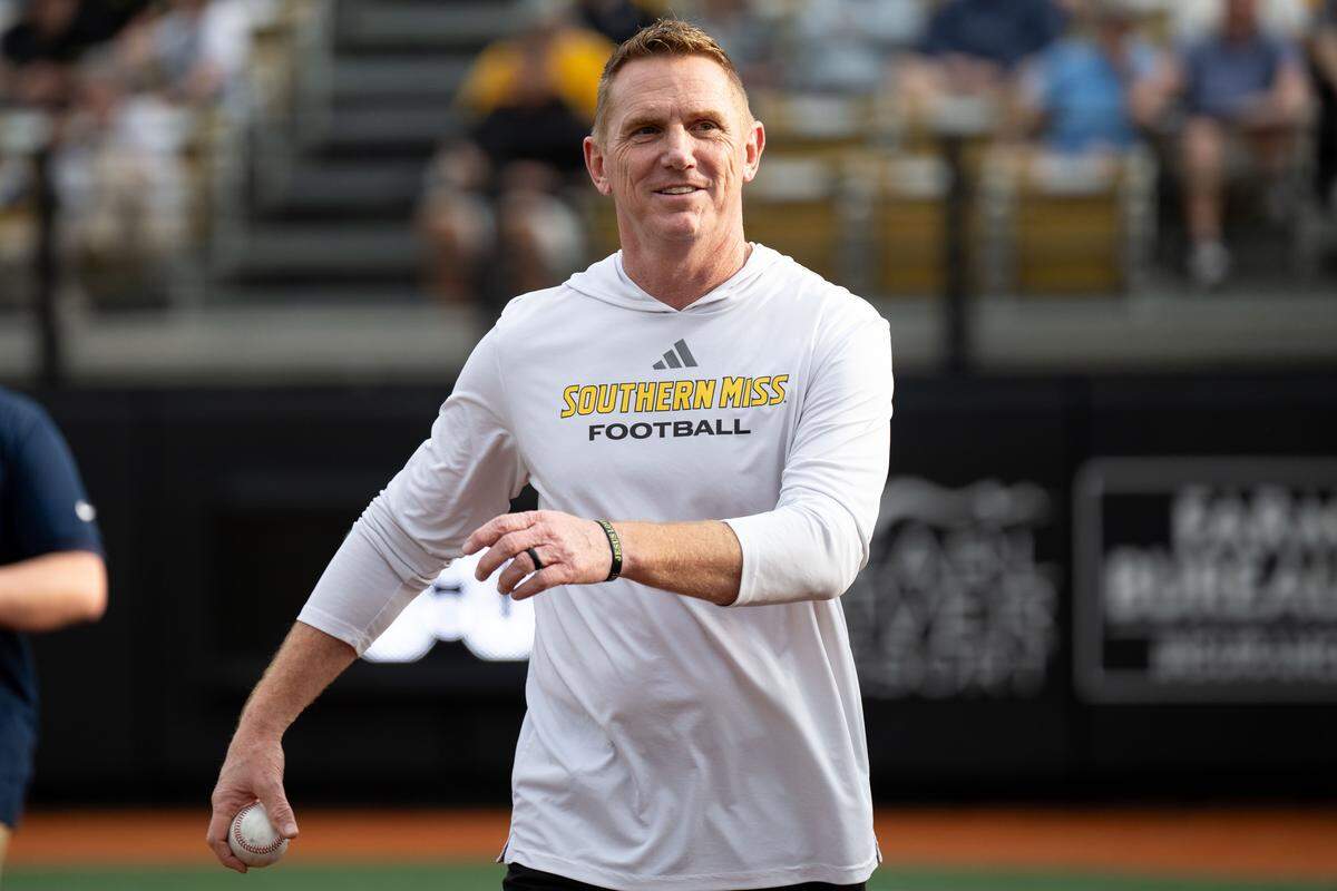 Southern Miss head football coach Blake Anderson walks off the field after throwing the first pitch during a baseball game at Pete Taylor Park in Hattiesburg on Tuesday, March 10, 2026.
