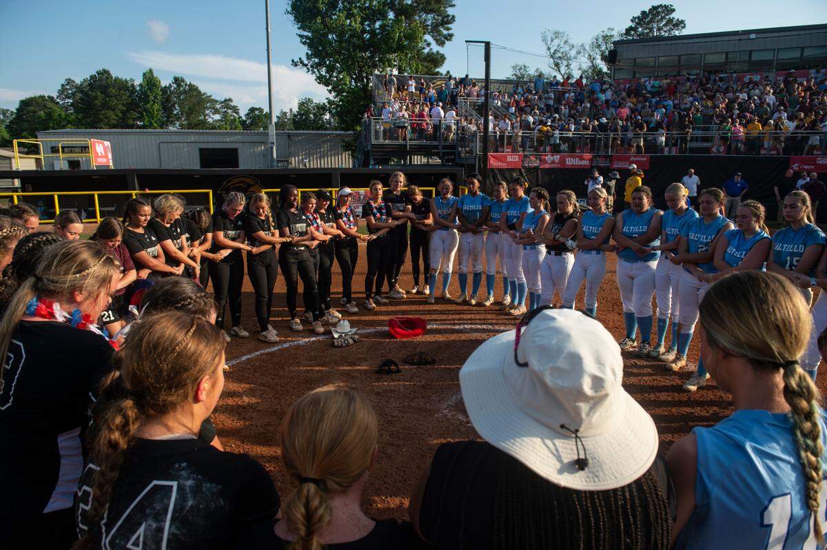 George County Lady Rebels’ pray with Saltillo after beating Saltillo in the 5A 2023 MHSAA Softball Championship game at USM Softball Complex in Hattiesburg on Thursday, May 18, 2023.