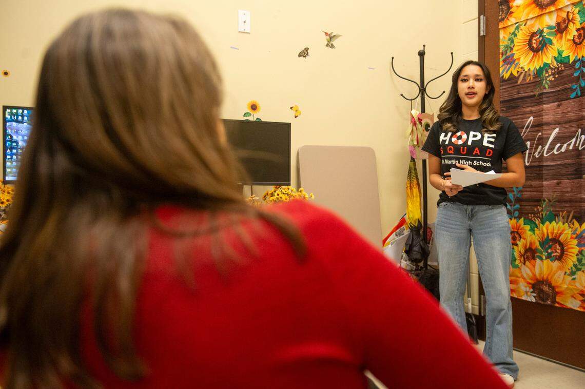 Vicky Vo, a St. Martin High School senior, and Paige Roberts, CEO of the Jackson County Chamber of Commerce, work on a speech Vo gave before the Mississippi Senate. Vo is a member of Hope Squad, a student organization aimed at preventing suicide.