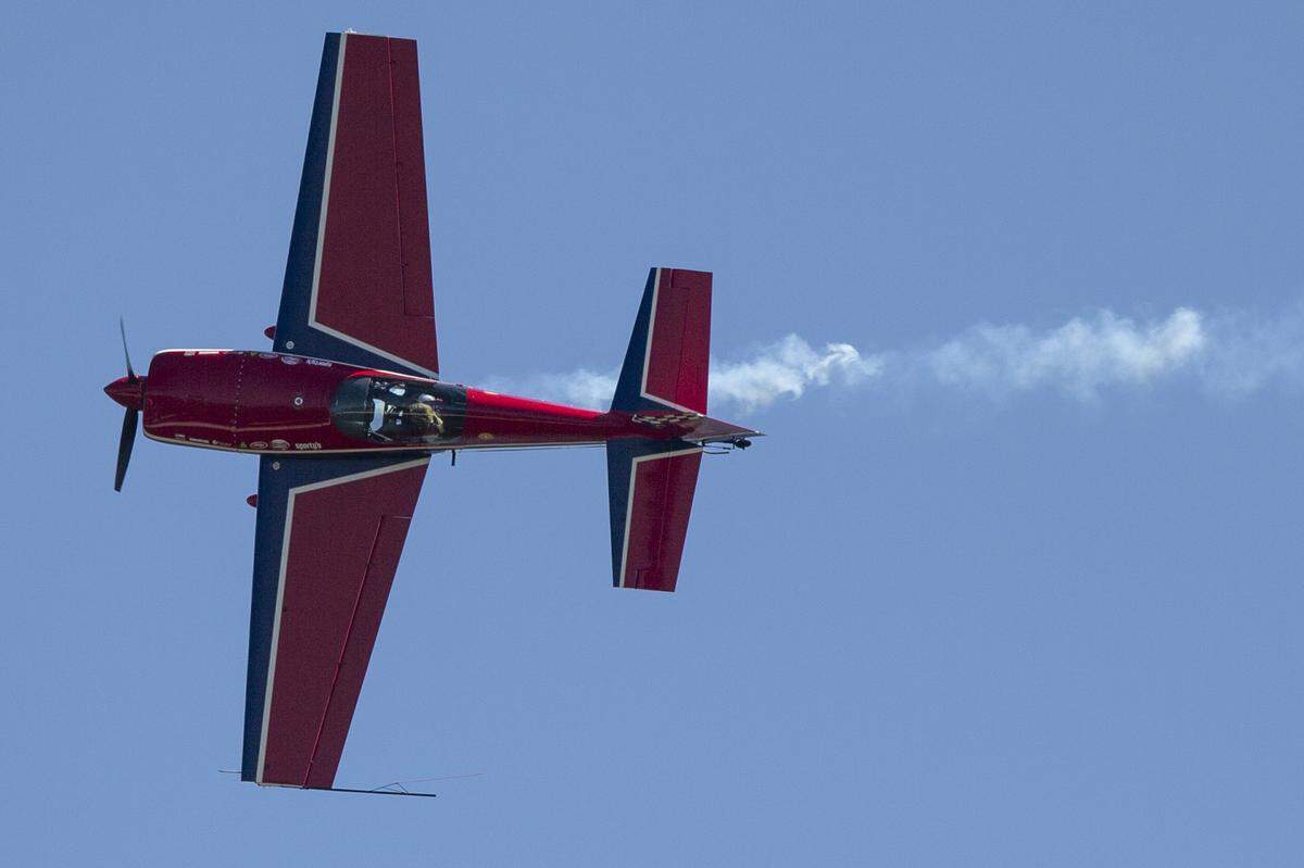 A propellor plane flies over Biloxi during a practice for the Thunder Over the Sound airshow on Friday, April 28, 2023.