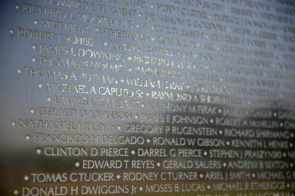 Names of those killed in action in the Vietnam War line The Wall That Heals, a three-quarter scale replica of the Vietnam Veterans Memorial in D.C. The wall, which is transported from city to city around the country, was on display in D’Iberville on Thursday, April 10, 2025.