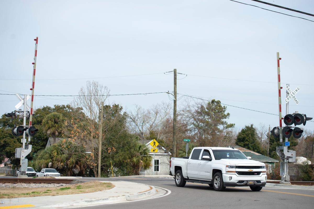 A truck crosses over the Main Street railroad crossing in Biloxi on Tuesday, Jan. 28, 2025.