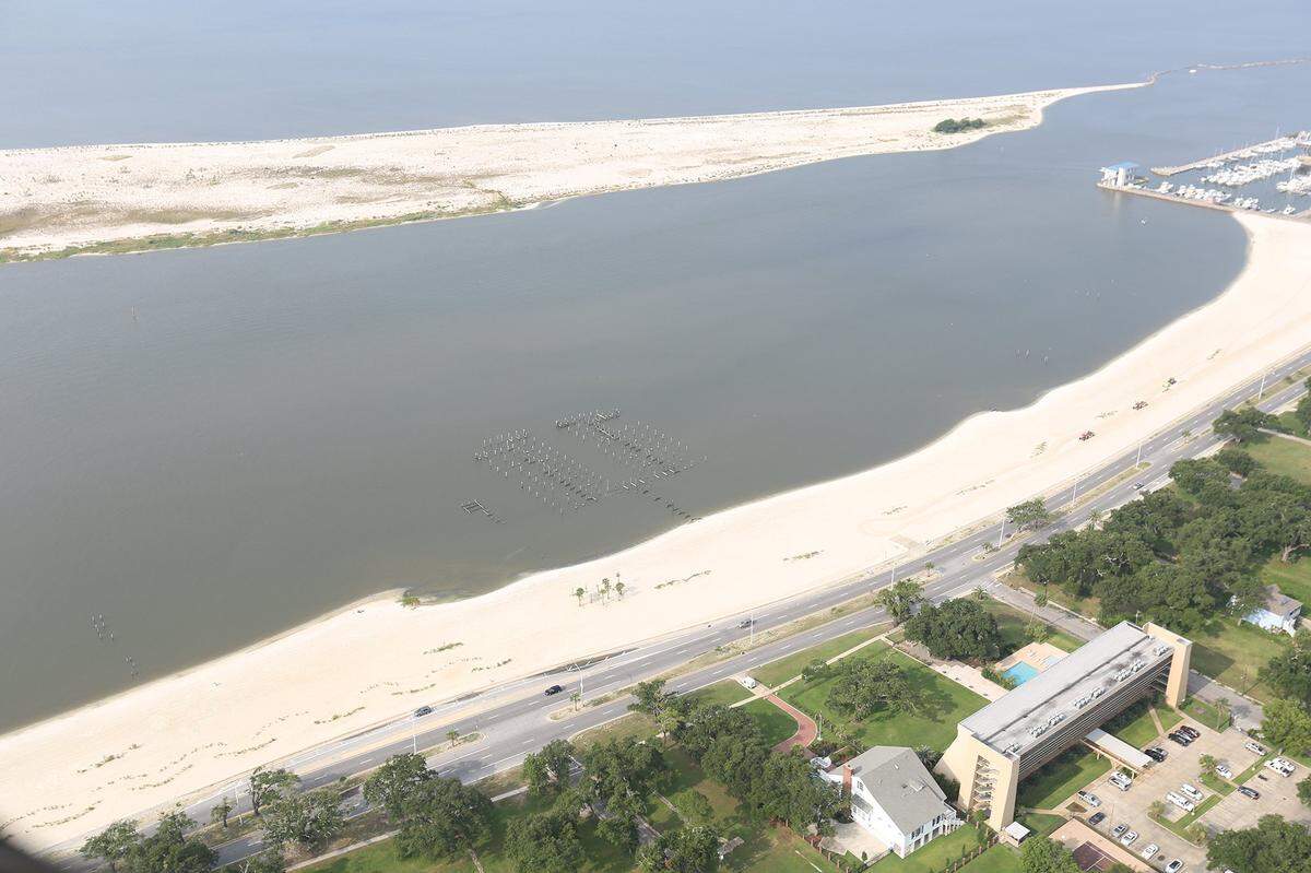 The western tip of Deer Island, shown on July 30, 2015, shows the proximity of the island to the Biloxi mainland and casinos. An eight-acre site on the island is listed for sale.