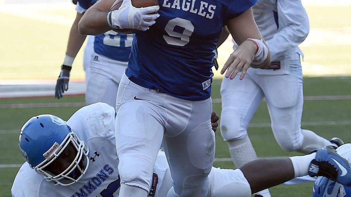 CHRIS TODD/SPECIAL TO THE SUN HERALD 
 Resurrection Catholic's Patrick Watts (9) scores leaving Simmons defenders in his wake on Friday, December 4, 2015, at the MHSAA State Football Championships in Vaught-Hemmingway Stadum on the Ole Miss Campus in Oxford, Miss.