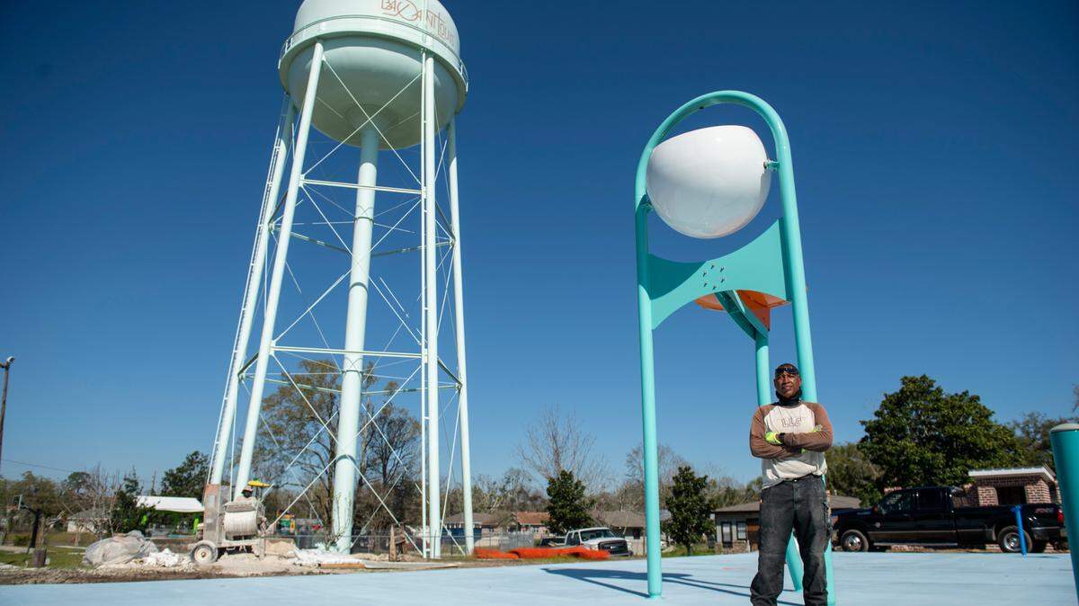 Third ward councilman Jeffrey Reed poses for a portrait on a new splash pad at MLK Park in Bay St. Louis on Thursday, March 17, 2022. Reed has been working to renovate the park in hopes that it will become more of a gathering place for the community.