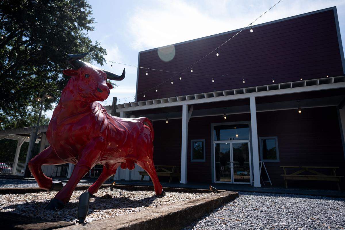 A bull statue outside Farm and Flame in Ocean Springs on Tuesday, Sept. 30, 2025. The restaurant is closed for the winter.