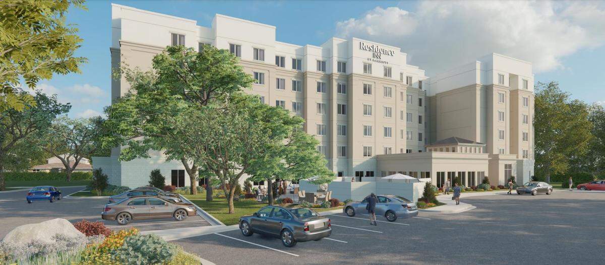 A rendering shows the redesigned exterior of a proposed Marriott Residence Inn at the beach in Biloxi.