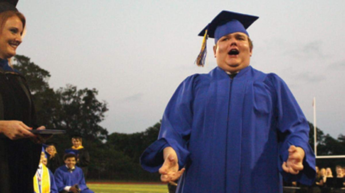 STACEY CATO/SEA COAST ECHO 
 Bay High graduate Christian Ivy receieved the "Super Hero" award at the 2016 commencement ceremony.