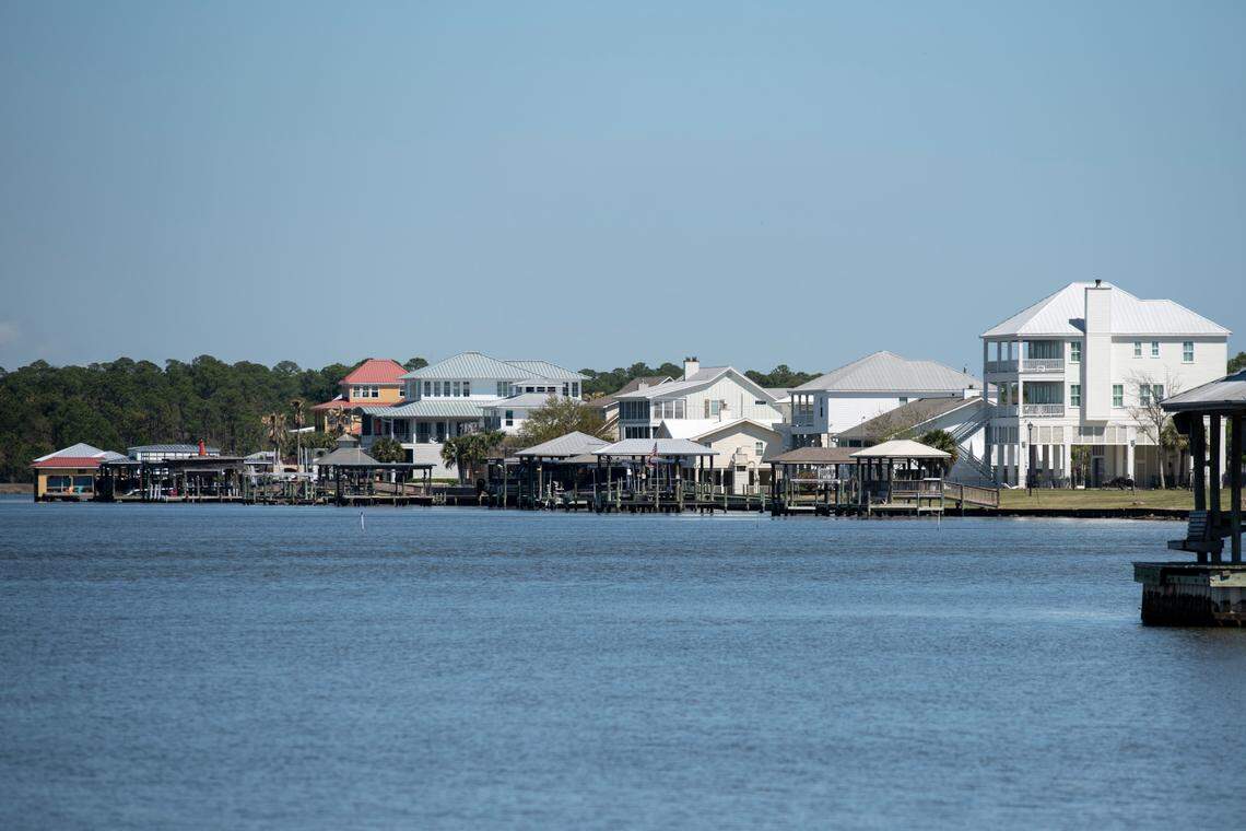 Homes in the Timber Ridge subdivision that face Saint Louis Bay in Pass Christian on Tuesday, March 25, 2025.