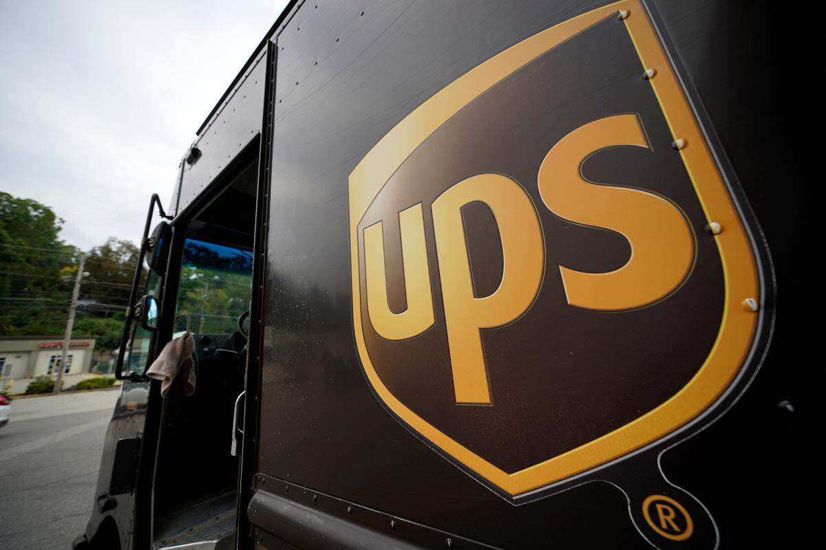 FILE - The UPS logo is displayed on the side of a delivery truck in Mount Lebanon, Pa., Sept. 21, 2021. The Environmental Protection Agency has reached a settlement with the private United Parcel Service to resolve violations of hazardous waste regulations at more than 1,100 facilities across 45 states and Puerto Rico, the agency said Wednesday, Oct. 19, 2022. (AP Photo/Gene J. Puskar, File)