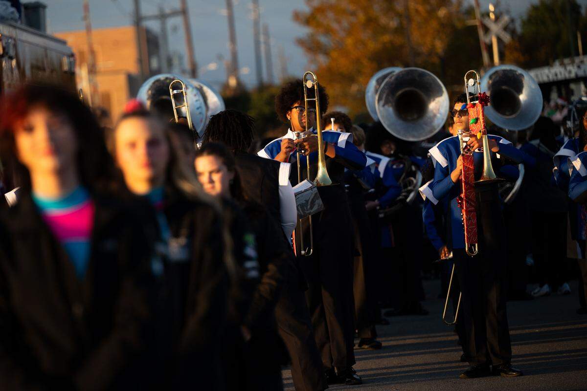 Gulfport band members get ready before the Champions Christmas Parade in Gulfport on Monday, Dec. 8, 2025.