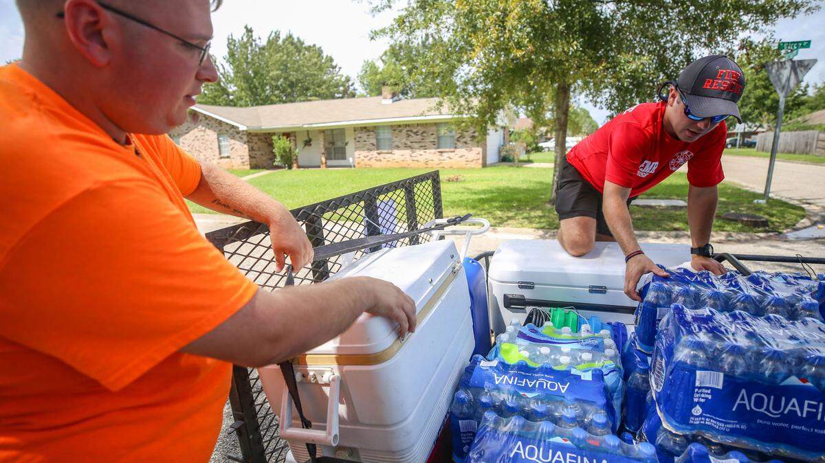 Volunteers Jourdan Hartshorn and Colin Bush packed a trailer in Gulfport to meet other volunteers in Louisiana with the first responders mutual aid relief team. The group fed first responders and volunteers helping after Hurricane Laura hit Louisiana and Texas. August 28, 2020. Now South Mississippi residents are helping after Hurricane Sally hit Alabama and Florida.
