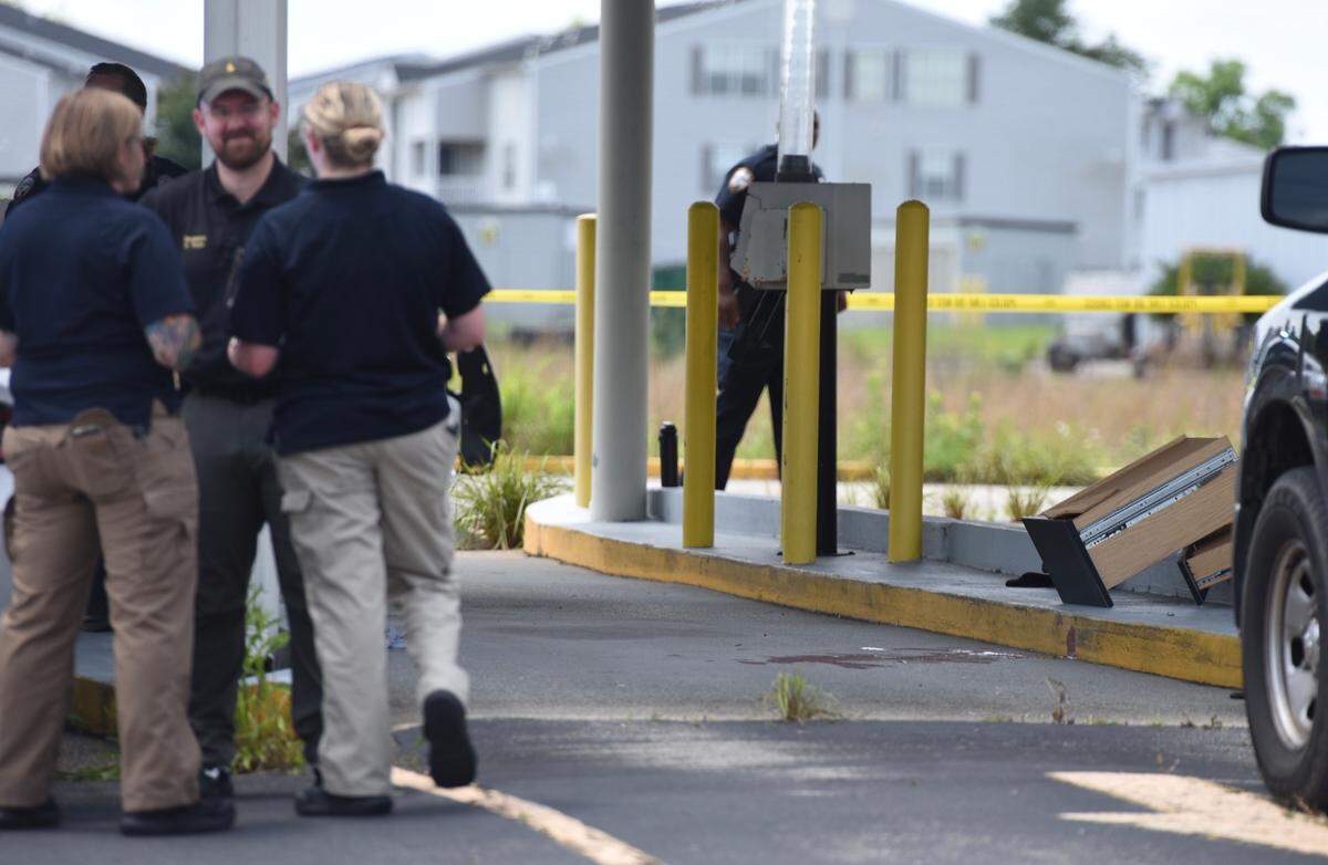 Blood is visible on the ground at the scene of an officer-involved shooting that occurred Wednesday morning at an old bank building on Dedeaux Road and Three Rivers Road in Gulfport.