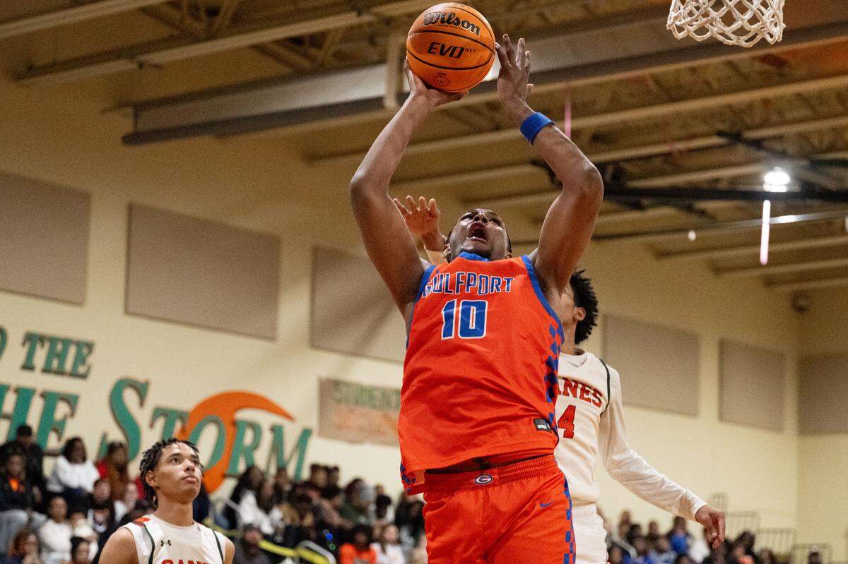 Gulfport's Travor Frost (10) puts a shot up Tuesday in the Admirals’ win over West Harrison.