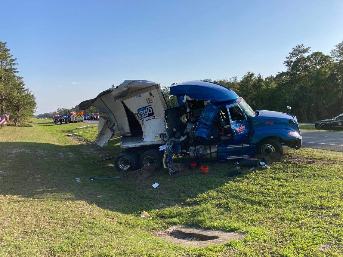 The driver of a semi-truck failed to stop “for unknown reasons” before crashing into the back of a stopped school bus in Levy County, Florida, according to Florida Highway Patrol.