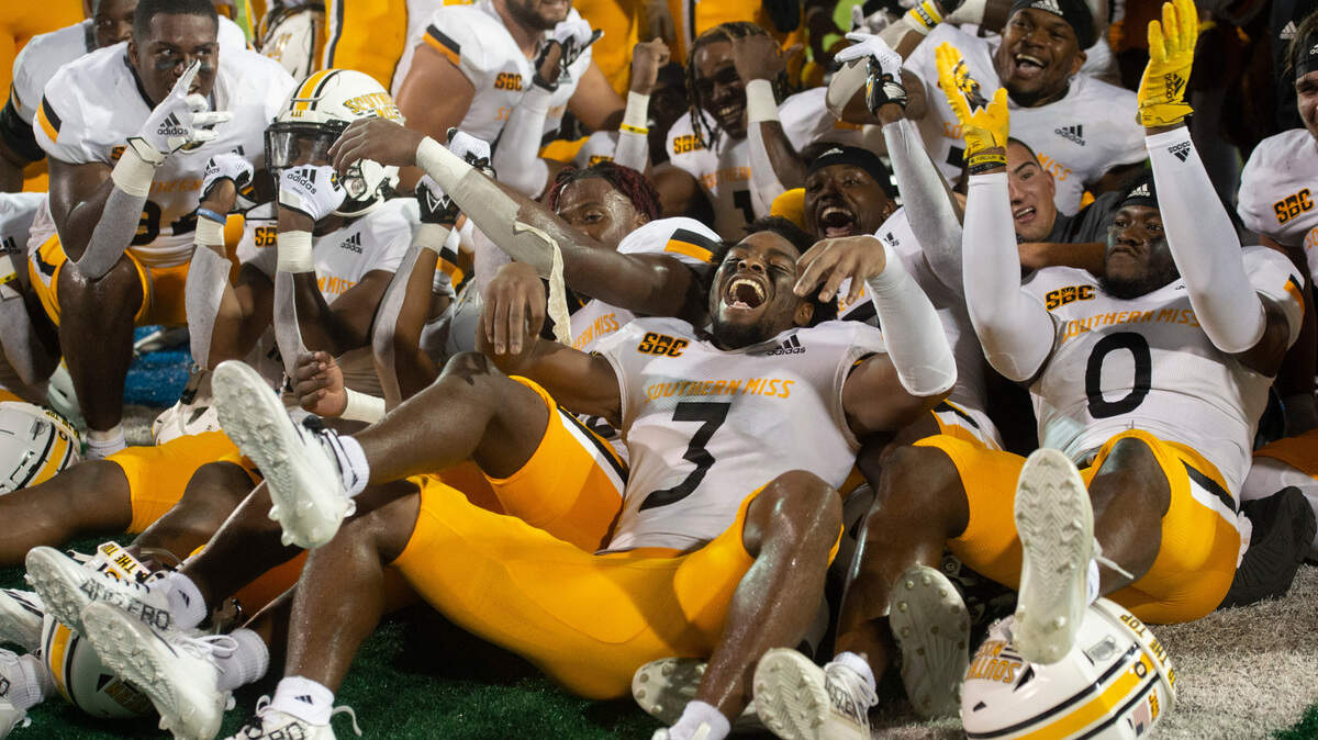 Southern Miss players celebrate after beating Tulane at Yulman Stadium in New Orleans on Saturday, Sept. 24, 2022.