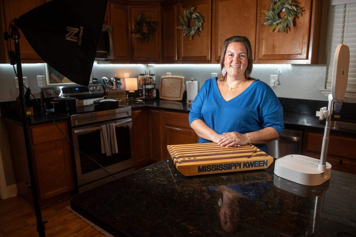 Caroline Davis, who is known as Mississippi Kween to her almost 2 million social media followers, poses for a portrait at her home in Bay St. Louis on Tuesday, July 23, 2024. Davis primarily makes cooking videos in her home kitchen.