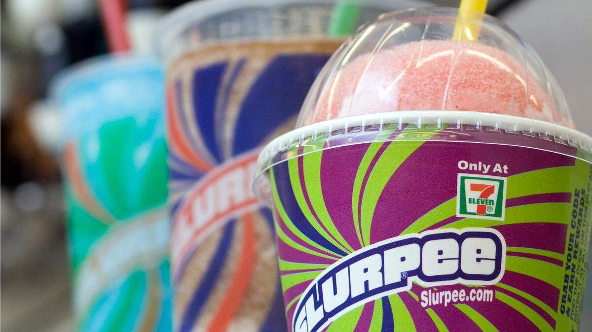FILE - In this Nov. 10, 2010, file photo, Slurpees are displayed at a 7-Eleven store. (AP Photo/Larry Crow, File)