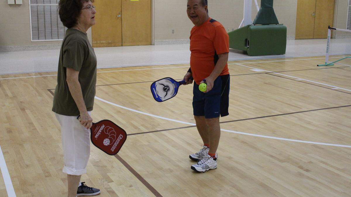 JEFF CLARK/SUN HERALDJason David and Sharon Hinkle get ready for a game of pickleball at the Donal Snyder Community Center in Biloxi.