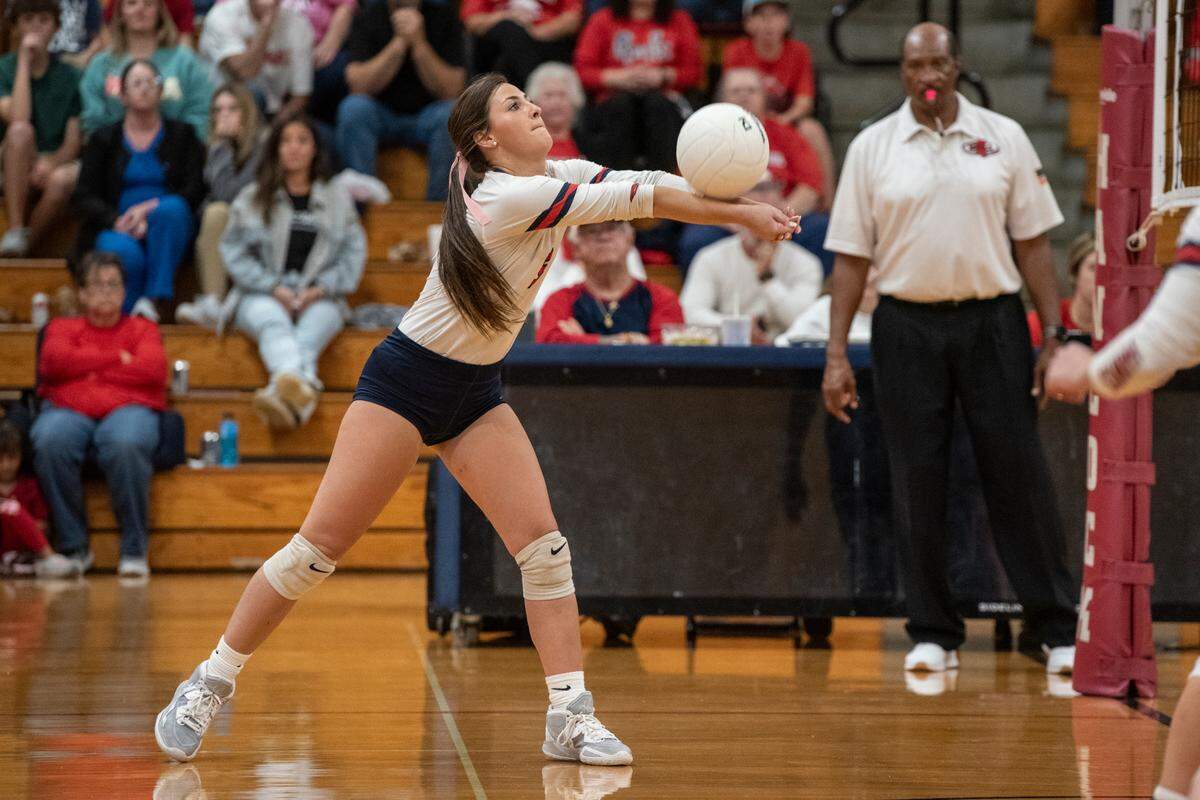 Hancock’s Cambria Necaise bumps the ball during the 6A South State Championship game at Hancock High School in Kiln on Monday, Oct. 16, 2023.
