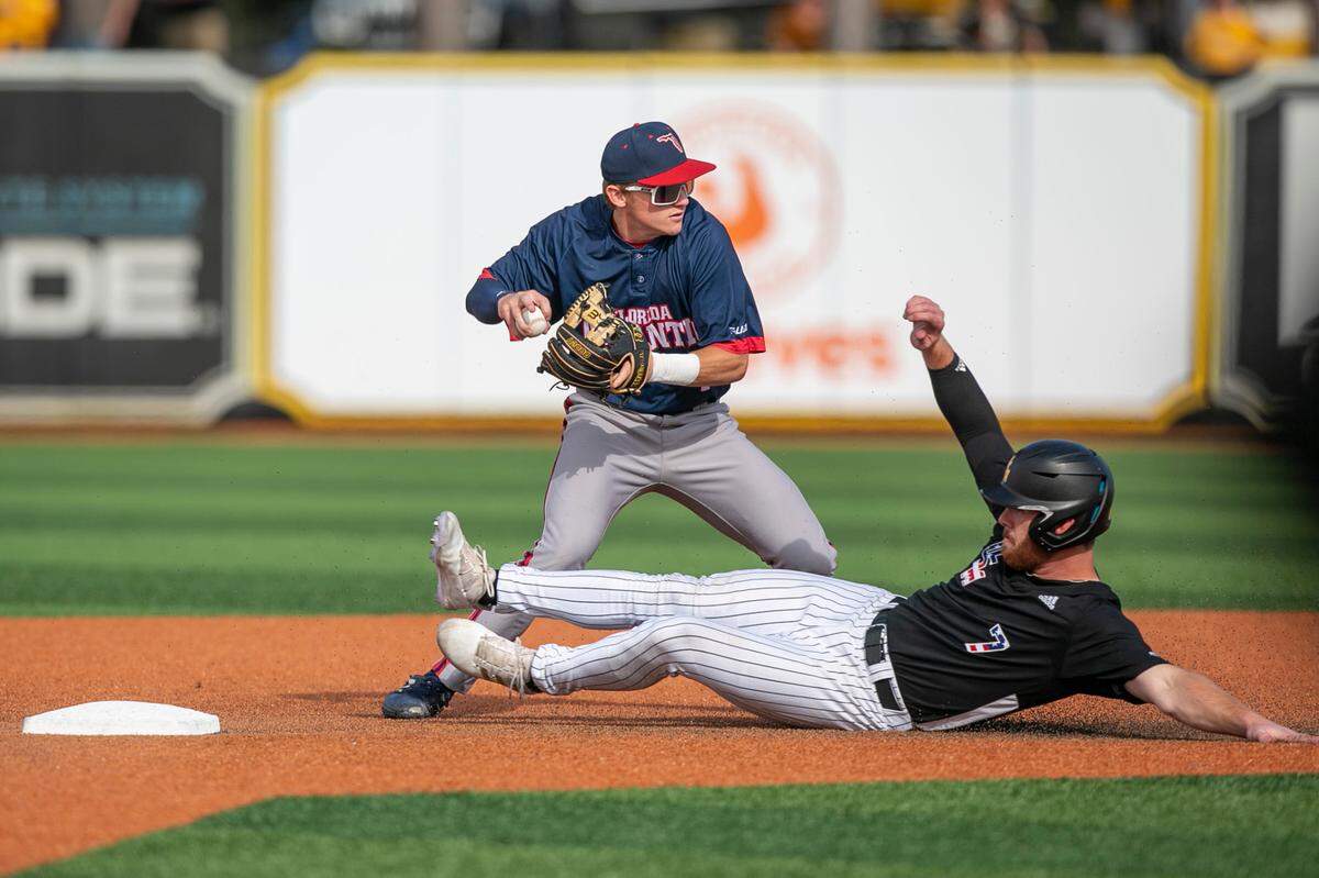Slade Wilks slides into second base during a game against Florida Atlantic University at Pete Taylor Park in Hattiesburg on Saturday, March 19, 2022.