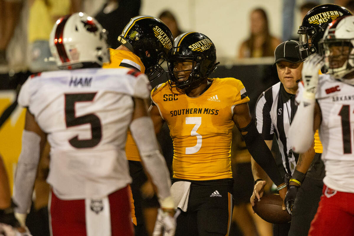 Southern Miss Golden Eagles quarterback Ethan Crawford (3) reacts after scoring during a game between Southern Miss and Arkansas State at M.M. Roberts Stadium in Hattiesburg on Saturday, Oct. 19, 2024.