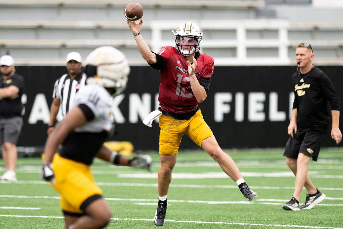 Southern Miss quarterback John White (12) looks to deliver a pass Saturday during the Southern Miss Spring Football Showcase.