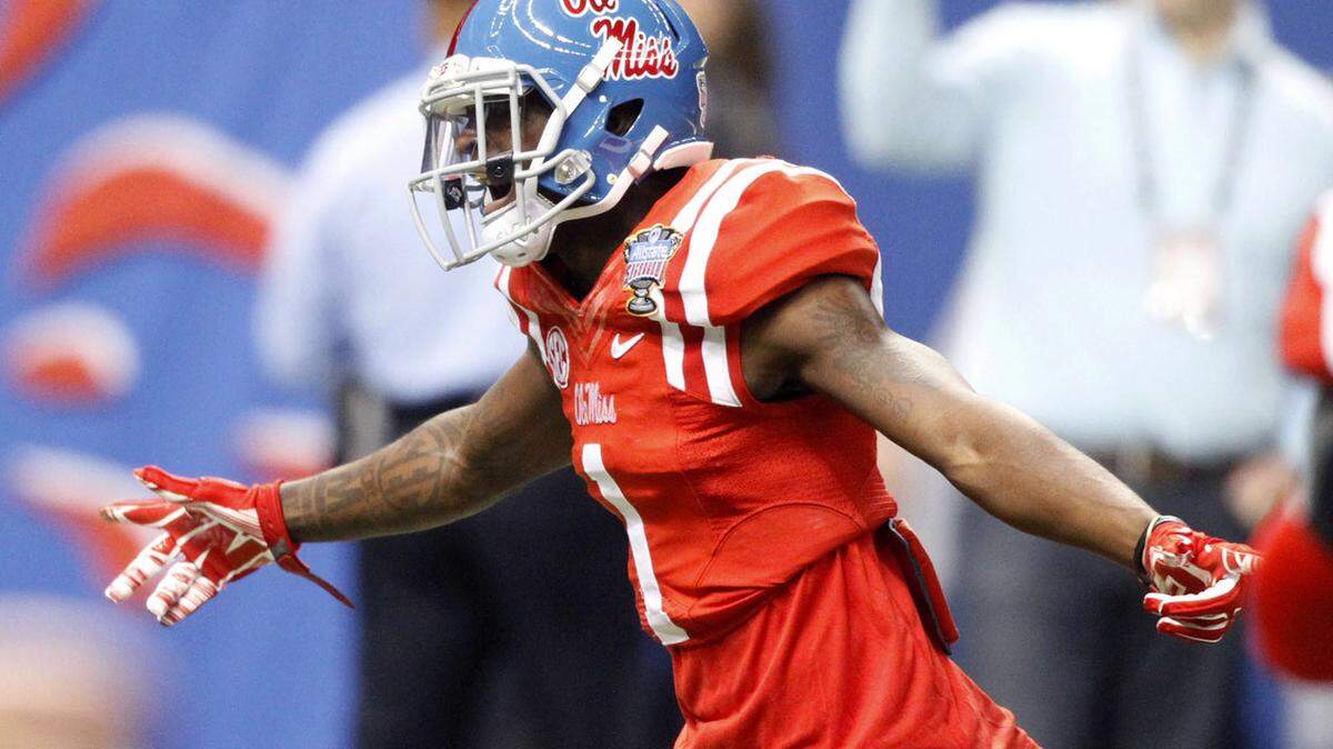 TIM ISBELL/SUN HERALD 
 Laquon Treadwell leads the Ole Miss Rebels on to the field at the All State Sugar Bowl. Treadwell could go as high as 12th overall to the New Orleans Saints.