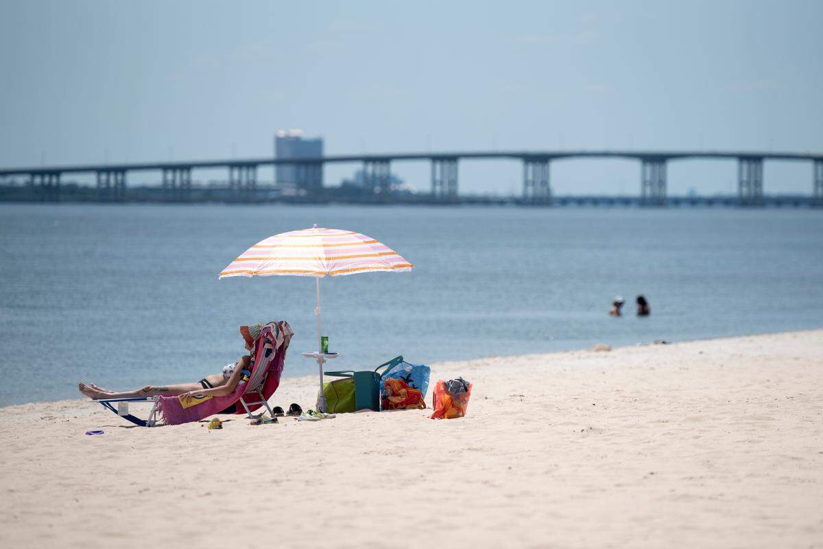 A day at the beach in Ocean Springs and a night at the restaurants help put the city among the top beach towns selected by Southern Living readers.