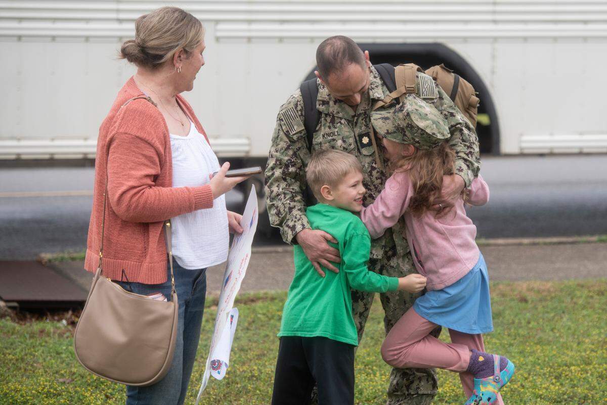 Members of Naval Mobile Construction Battalion 133 reunite with their families after returning from deployment at a homecoming event at the Naval Construction Battalion Center in Gulfport on Tuesday, March 5, 2024.
