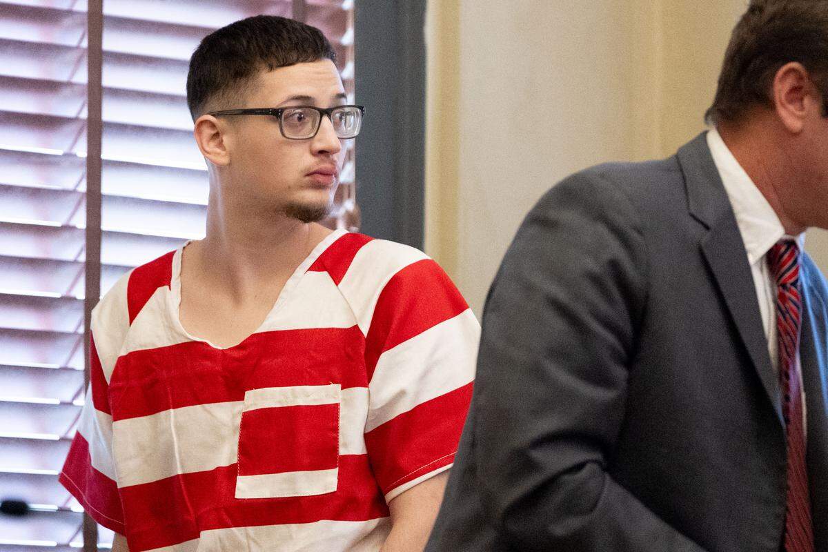 Cameron Brand is taken out of the courtroom during a motion hearing at Hancock County Circuit Court on Oct. 21, 2025.