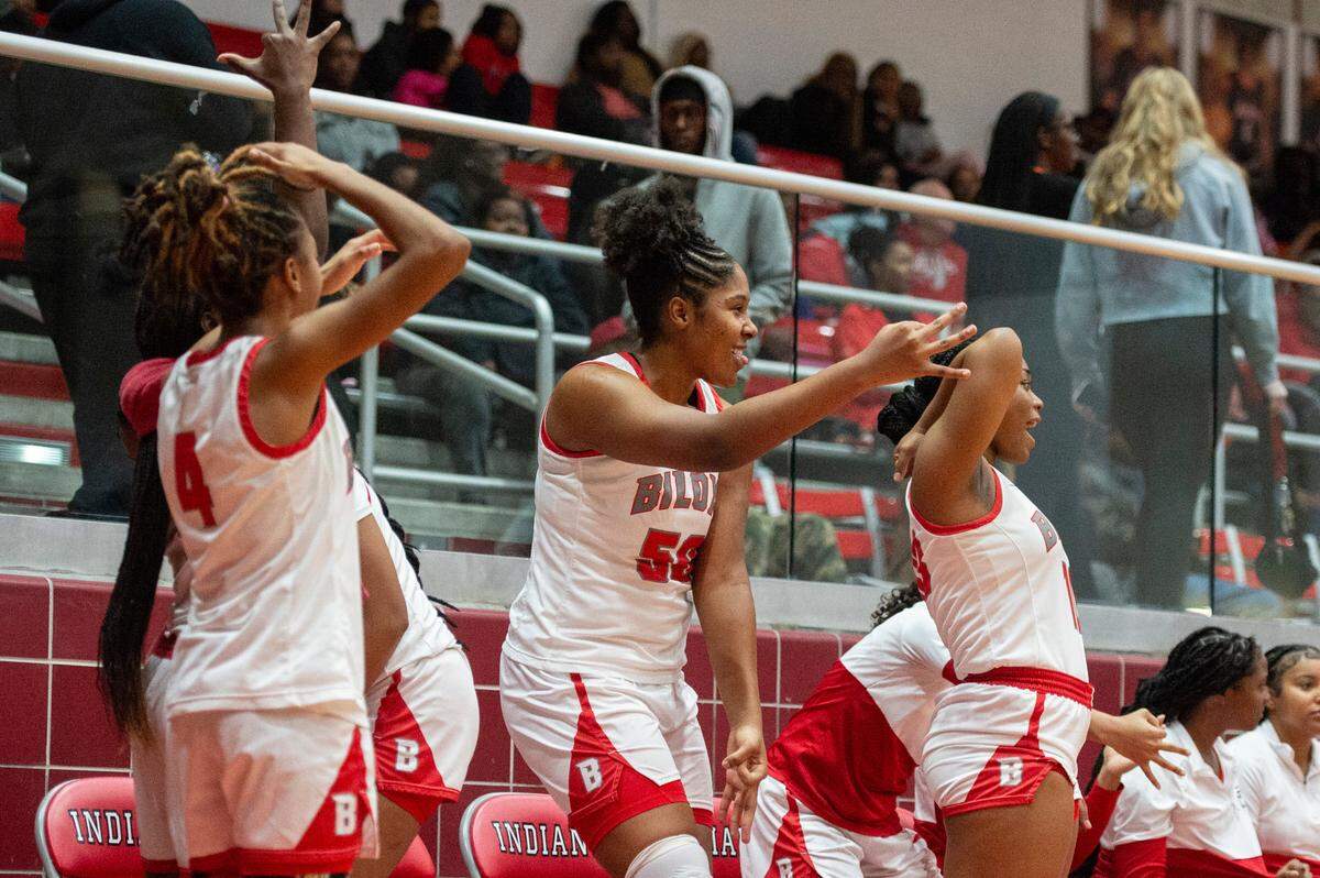 Biloxi players cheer on their teammates during a victory over St. Martin at Biloxi High School in Biloxi on Tuesday, Jan. 7, 2025.