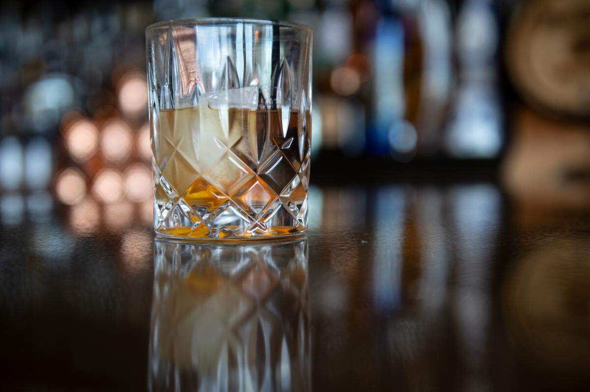 Instead of spending time tending bar at holiday parties, mix batches of bourbon cocktails and other drinks ahead of time.