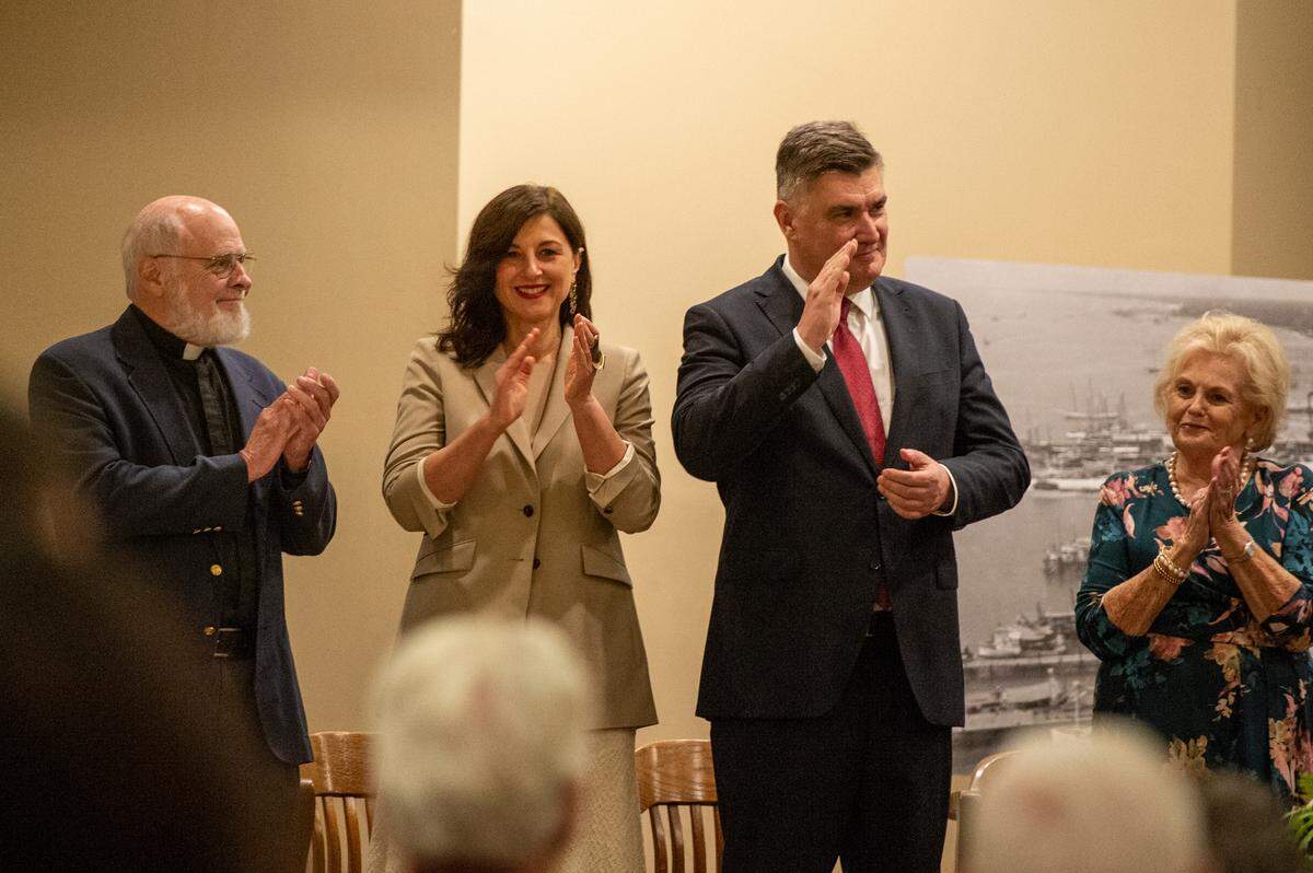 Croatian President Zoran Milanović and his wife First Lady Sanja Musić Milanović wave as they are welcomed at the Croatian American Cultural Center in Biloxi, Miss. on Friday, Sept. 22, 2023.