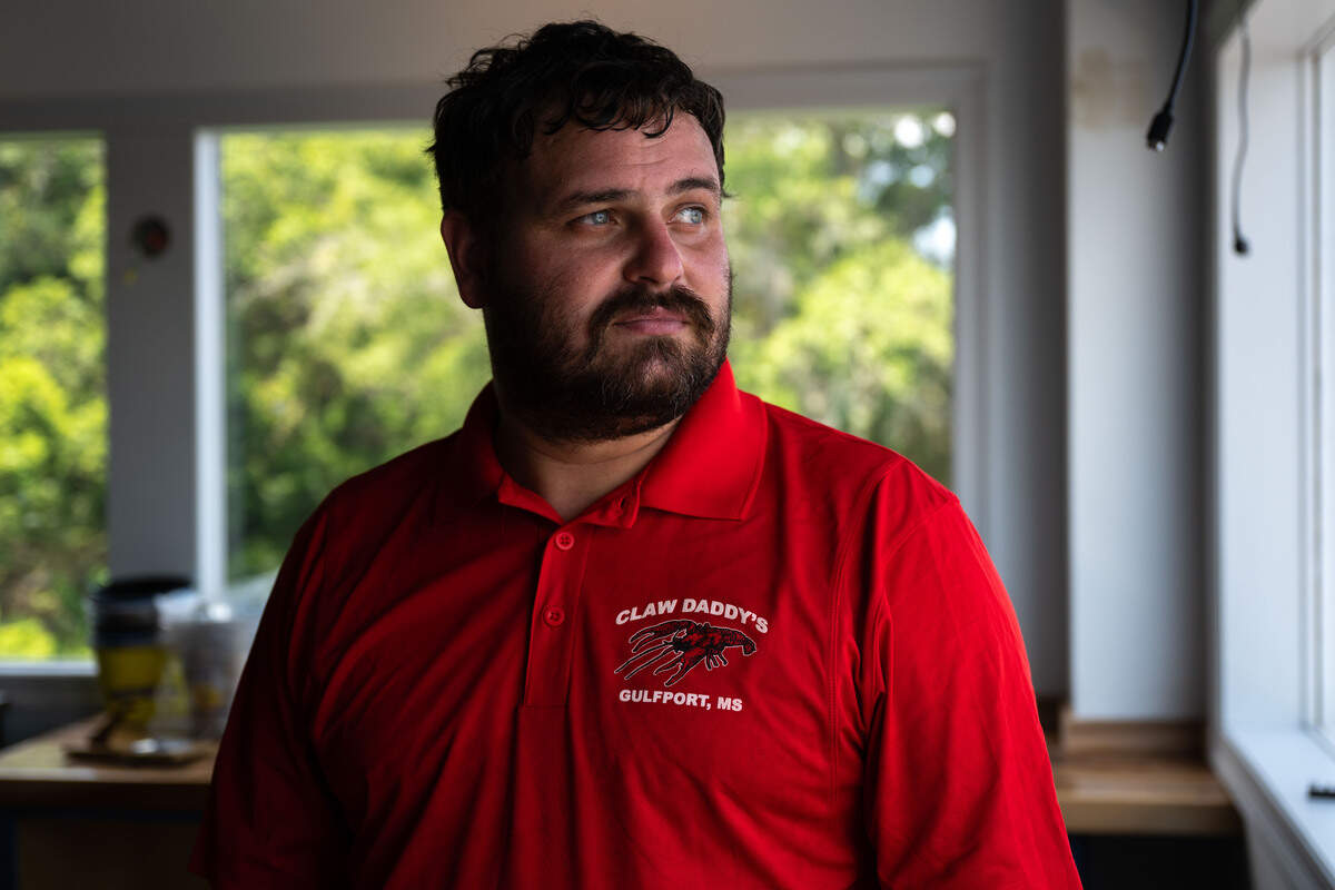 Cameron Cuevas poses for a portrait at Claw Daddy’s new location in Gulfport on Wednesday, July 8, 2026.