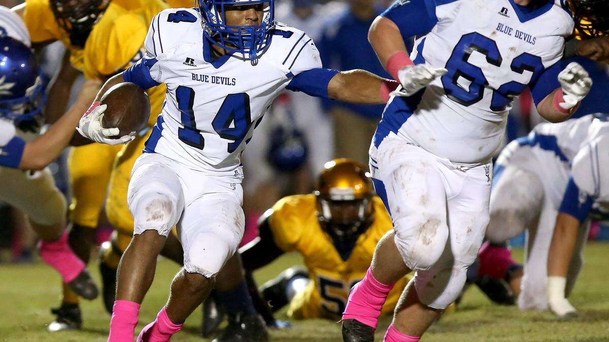 AMANDA McCOY/SUN HERALD 
 Pearl River Central's Michael Tatman (14) past Picayune with 125 yards and a touchdown.