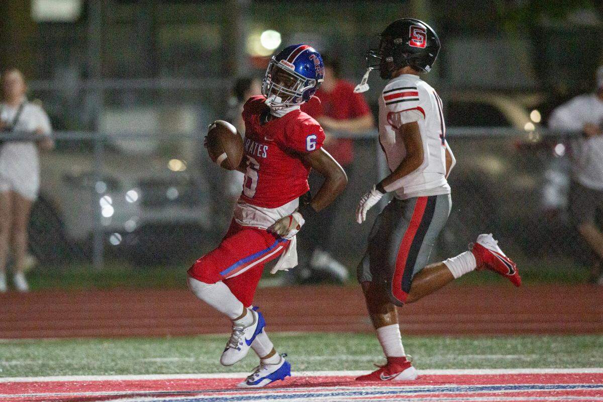 Pass Christian’s Matthew Daniely runs the ball in for a touchdown during a game between Pass Christian and St. Stanislaus at Francis McDonald Stadium in Pass Christian on Friday, Sept. 20, 2024.