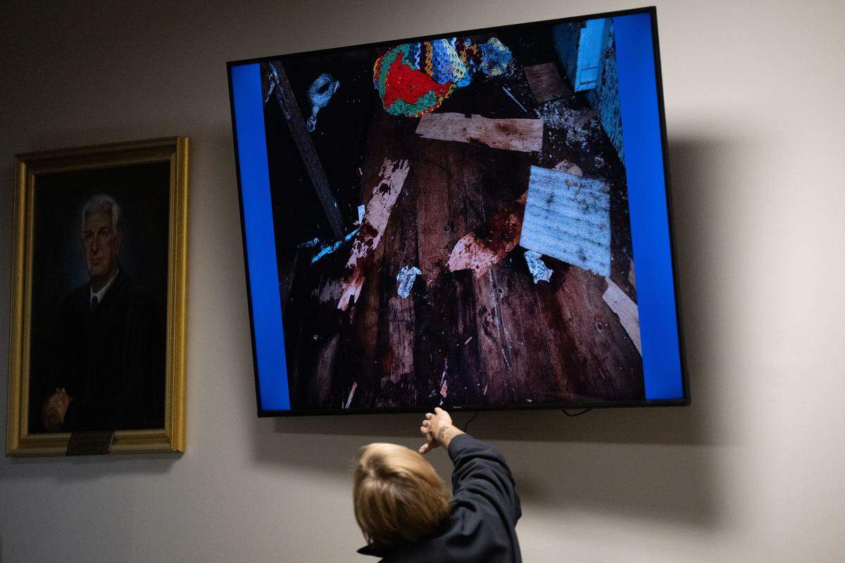 Crime scene photographs presented Tuesday by Stephanie Fehr during a testimony hearing at Harrison County Circuit Court.