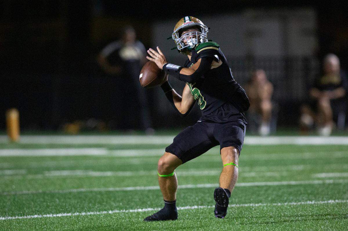 Poplarville’s Zack Case throws a pass during a playoff game between Poplarville and Mendenhall at Poplarville on Friday, Nov. 8, 2024.