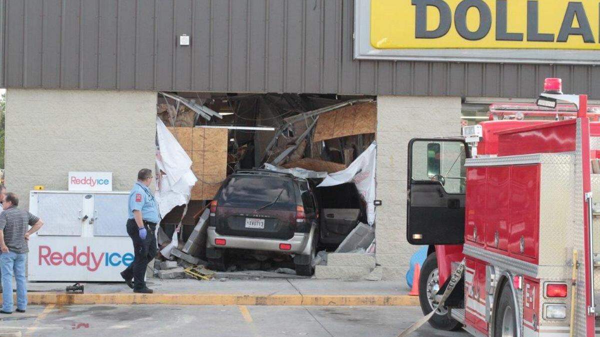 PAT SULLIVAN/HARRISON COUNTY FIRE SERVICES 
 An SUV crashed through the front of the Dollar General store on Mississippi 53 at Saucier Lizana Road just after 4 p.m. Monday.