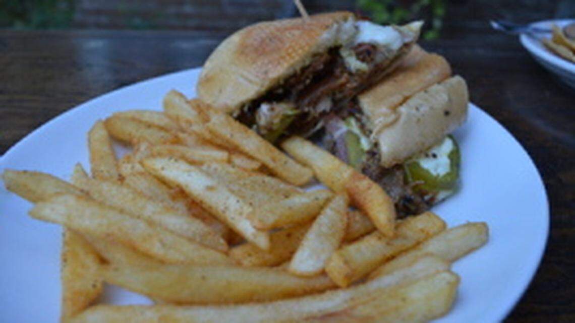 CHARLIE BENTON/SPECIAL TO THE SUN HERALDEight-hour Cuban Sandwich served at Mosaic Restaurant and Bar in Gulfport