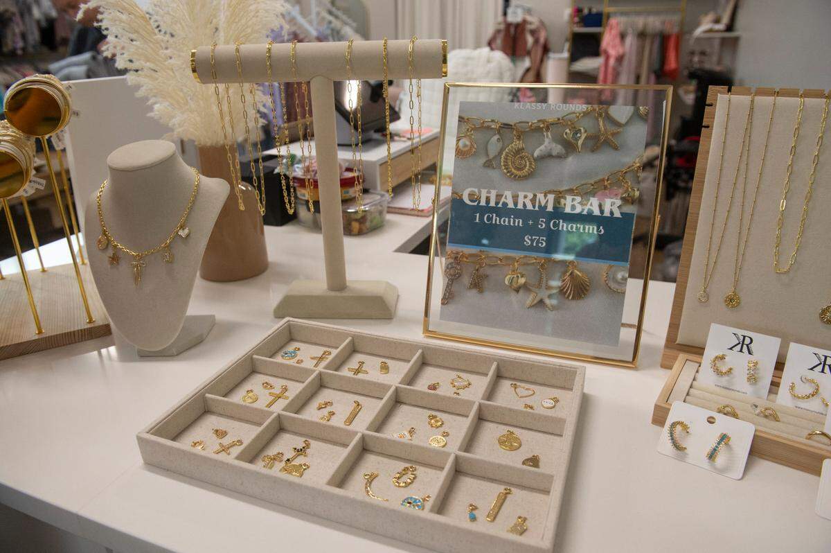 A charm bar is a special feature at the new Ivory Rose Boutique in Ocean Springs. Owner Jaclyn Rawls says the customizable charm bracelets and necklaces are bestsellers.