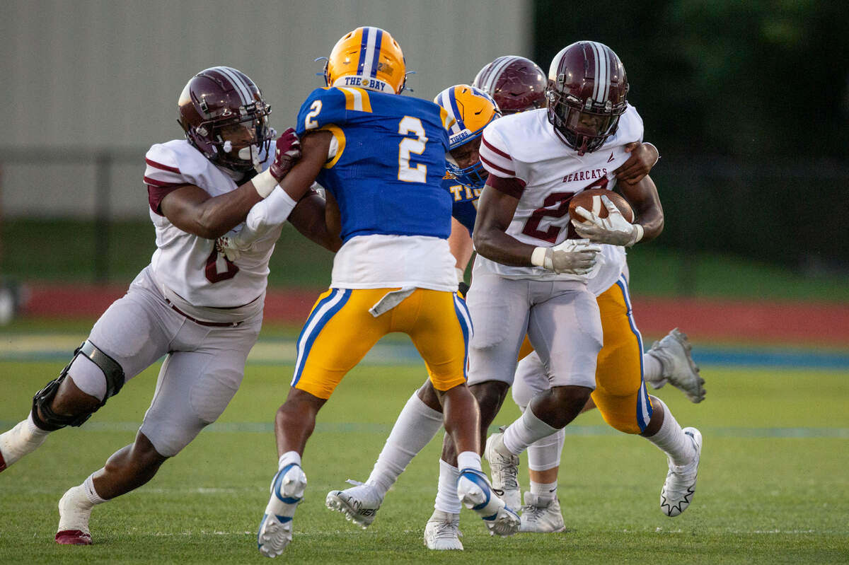Long Beach’s Junior Brown runs the ball during a game between Bay High and Long Beach at Tiger Stadium in Bay St. Louis on Friday, Sept. 13, 2024.
