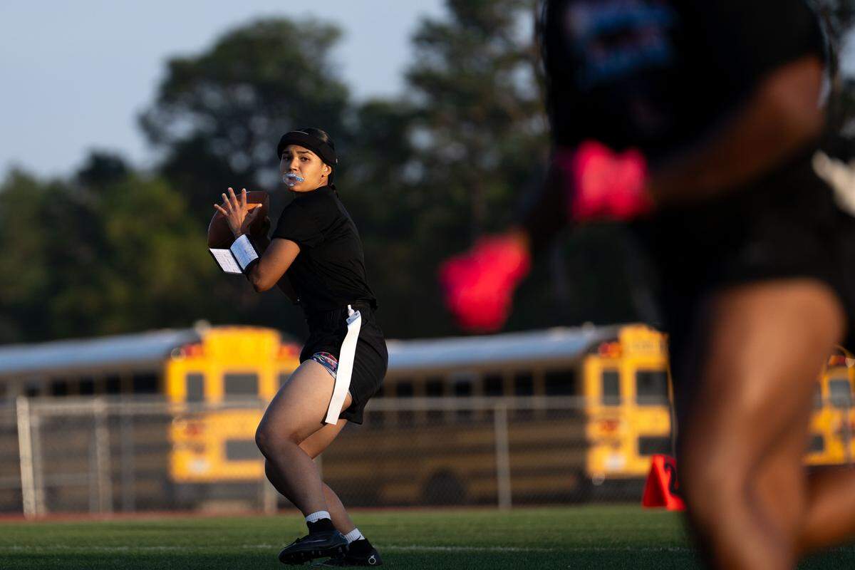 Pascagoula’s Genesis Delgado looks to pass the ball downfield Thursday.