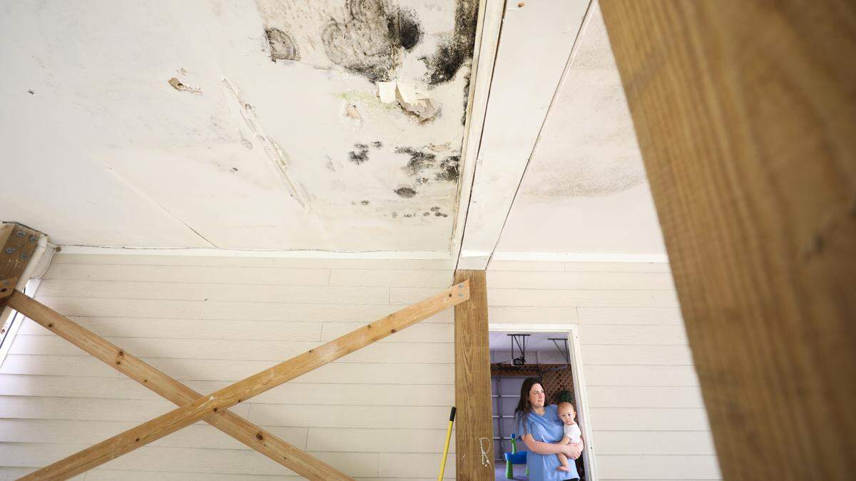 Jessica Crosby, who moved into a Pass Estates house in 2019, says one of the the first problems to crop up was mold, which has gotten worse since Hurricane Zeta in 2020. She says maintenance workers have painted over mold spots, but they keep coming back.